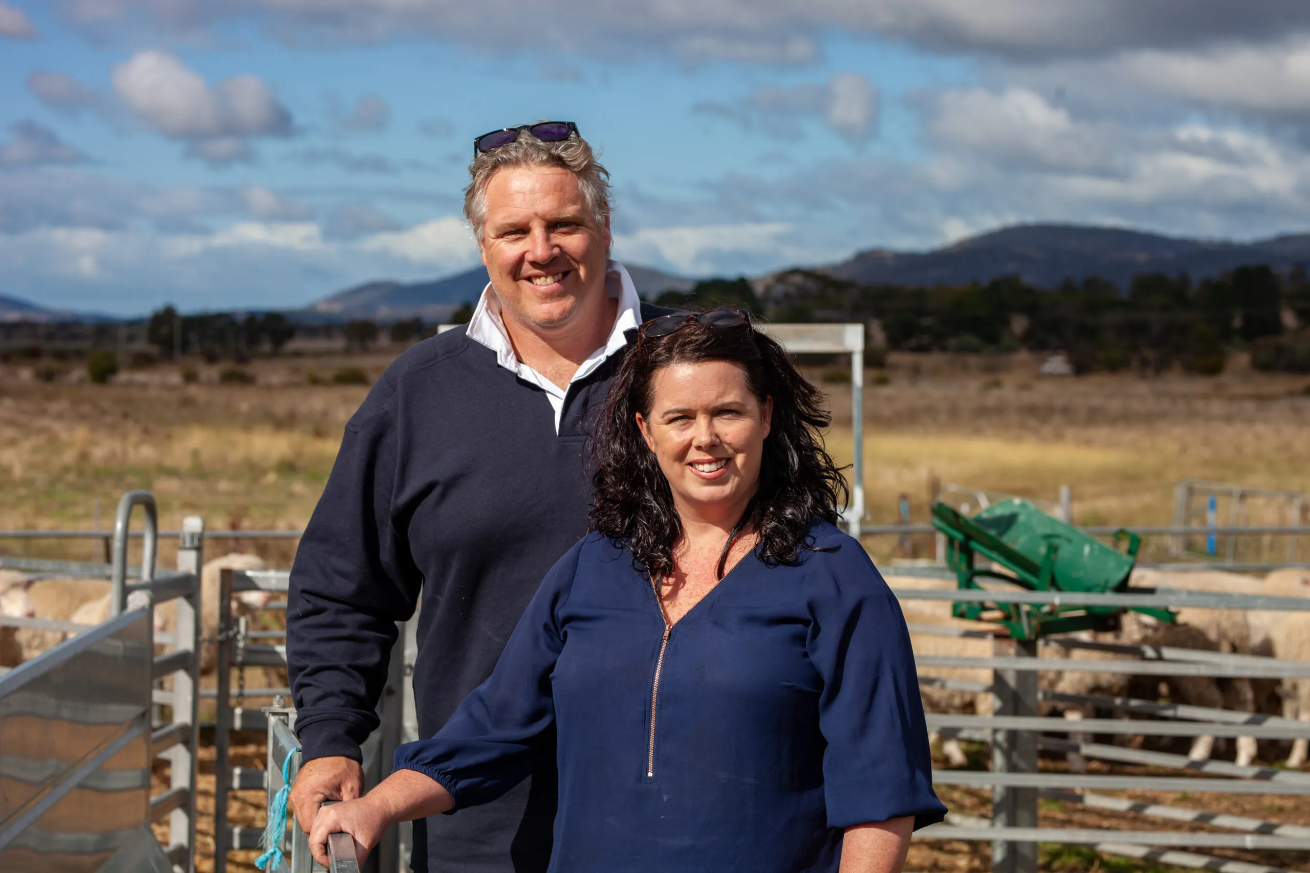 Daniel and Anita Long, owners of Coolgardie Farm in Richmond, Tasmania, standing together on their family farm